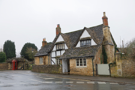 COTSWALD, GREAT BRITAIN - DEC 23, 2018: Rural architecture in Castle Combe in Cotswald, the prettiest village in UK. December 23, 2018 in Cotswold Great Britainのeditorial素材