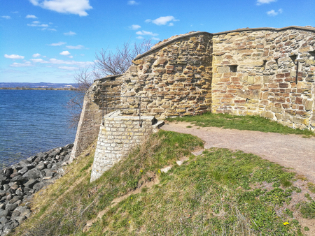 VISINGSO, SWEDEN - APR 14, 2019: The ruins of Nas castle at Visingso in the lake vattern, where the first swedish king Karl Sverkersson was killed in the year 1167. April 14, 2019, Visingso, Swedenのeditorial素材