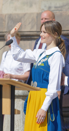 STOCKHOLM, SWEDEN - JUN 06, 2019: The swedish princess Sofia Hellqvist waiving to the audience outside the royal castle. Stockholm, Sweden June 06, 2019のeditorial素材
