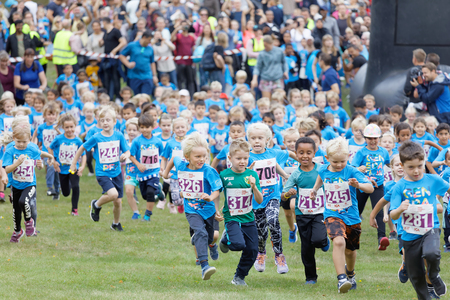 STOCKHOLM - SEPT 08, 2019: Many kids running during the Generation PEP day in Hagaparken to encourage kids to physical activity, initiated by prins Daniel. Stockholm,Sweden,September 08, 2019のeditorial素材
