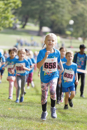 STOCKHOLM - SEPT 08, 2019: Kids running during the Generation PEP day in Hagaparken, to make kids be more physical active and more healthy, initiated by the swedish prins Daniel and princess Victoria. Stockholm,Sweden,September 08, 2019のeditorial素材
