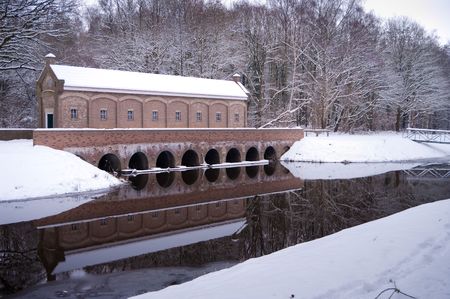 aqueduct in snowy dutch landscape
