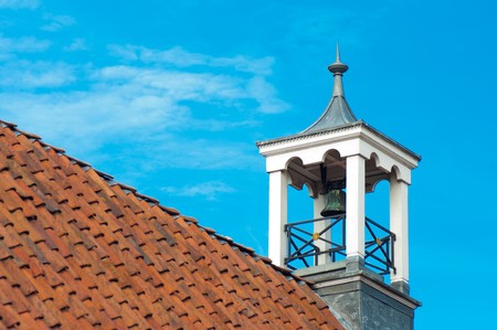 small belltower on the top of a churchの写真素材