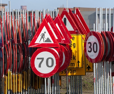 lots of traffic signs stored togetherの写真素材