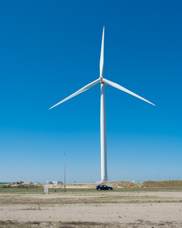 windmill against a blue sky at the Rotterdam Maasvlakteの写真素材