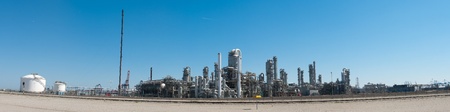 panorama shot of an oil refinery at the rotterdam harborの写真素材
