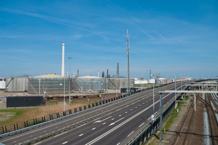 highway through industrial area of rotterdam harborの写真素材