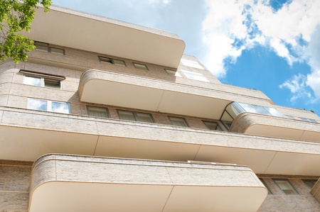 new apartment house with modern balconies on it