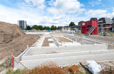 construction site with large foundation of a new buildingの写真素材