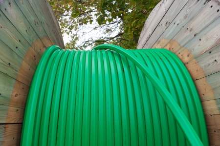 cable drum with green fiber glass cableの写真素材