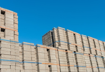 highly piled up bricks ready for transportの写真素材