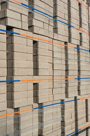 highly piled up bricks ready for transportの写真素材