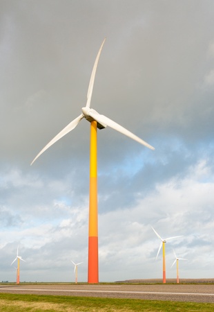 windmill farm with colorful windmills in Almere, netherlandsの写真素材