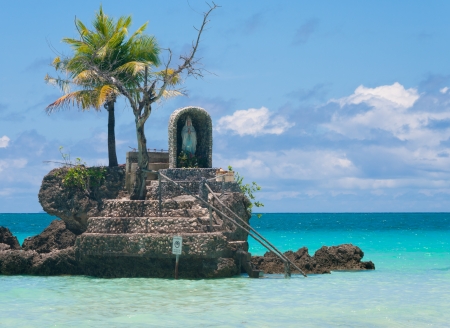 holy maria statue on a rock in the sea on Boracay island, Philippinesのeditorial素材