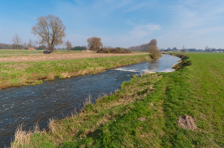 small river in a spring landscapeの写真素材