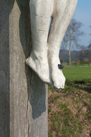 feet of jesus nailed at a crossの写真素材