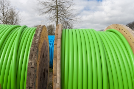 cable drum with green cable on itの写真素材