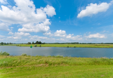 view of a dutch canal under a nice skyの写真素材