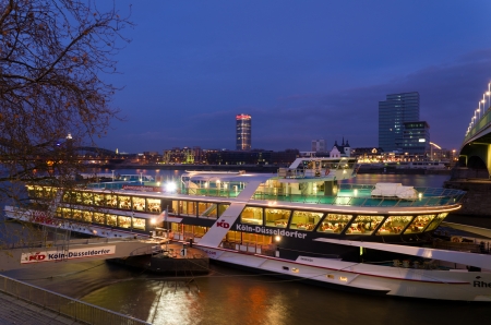 KD cruise boat moared at the quay in Cologne, Germany. They offer a varieity of cruises on the Rhine with different themes and destinationsのeditorial素材