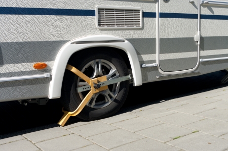 wheel clamp on a mobile home to prevent it from theftの写真素材