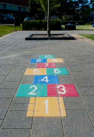 colorful hopscotch game on a schoolyardの写真素材