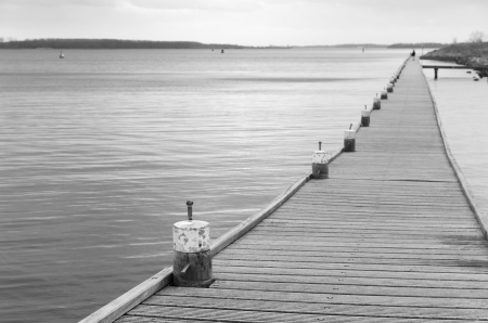 long wooden pier at the "Veerse meer" in the Netherlandsの写真素材