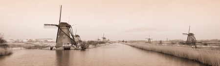 typical dutch windmills at Kinderdijk, Netherlands.の写真素材