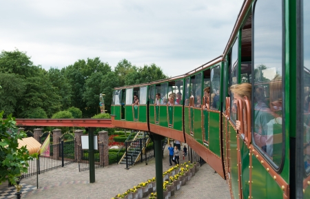 train with tourist in Slagharen amusement park in Netherlands.  In 2011 it attracted 1.45 million visitors and it employs 1000 peopleのeditorial素材