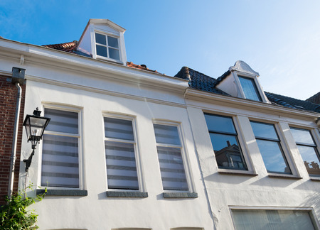 white facades of houses in zwolle, netherlandsのeditorial素材