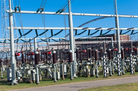 detail of a transformer station under a blue skyの写真素材