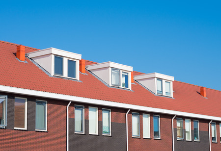 newly build terraced houses with dormer windowsの写真素材