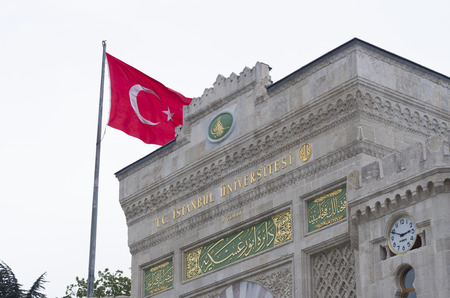 entrance gate of the istanbul university with turkish flagのeditorial素材