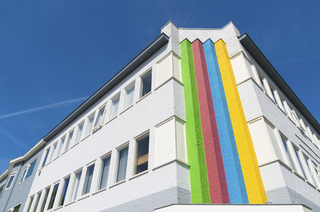 residential apartment building with rainbow decoration in utrecht, netherlandsの写真素材