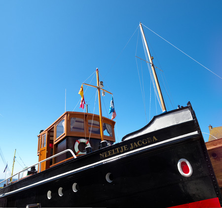 fishing boat in dry dock in Urk, Netherlands. Urk has by far the largest fishing fleet and fish processing industry in the Netherlands.のeditorial素材