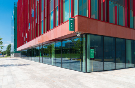 facade of a modern office building in Almere, netherlands. It is the youngest and fastest growing city in the country, founded around 1975.のeditorial素材