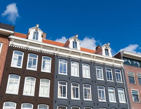 facades of monumental houses in the center of amsterdam