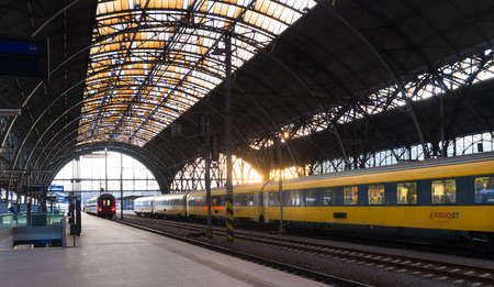 PRAGUE - DECEMBER 25, 2014: Blue train waiting at a platform on the Prague main Railway station. The station, located in the district of Vinohrady, is an international hub for trains from countries such as Germany, Austria, Poland, Slovakia and Hungary.のeditorial素材