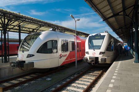 GRONINGEN, NETHERLANDS - AUGUST 22, 2015: Train platform at the groningen central train station. This station is the main railway hub of the northeastern part of the countryのeditorial素材