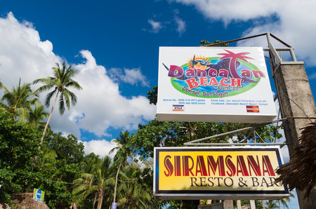 DONSOL, PHILIPPINES - JUNE 2, 2015: Sign board at a tropicall beach resort in the philippines. Donsol is a wellknown place for spotting whale sharksのeditorial素材