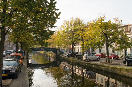 THE HAGUE, NETHERLANDS - OCTOBER 3, 2015: Picturesque canal  in the city center of The Hague. The Dutch government and parliament are located in the city, and it is the residence of the royal familyのeditorial素材