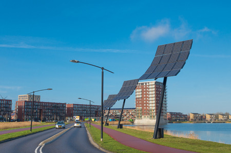 HEERHUGOWAARD, NETHERLANDS - JANUARY 23, 2016: Entrance of the city of the sun, the largest energy neutral residential area in the world. It produces as much energy as it consumes using 3.75 megawatt photovoltaic solar panels and 3 wind turbinesのeditorial素材