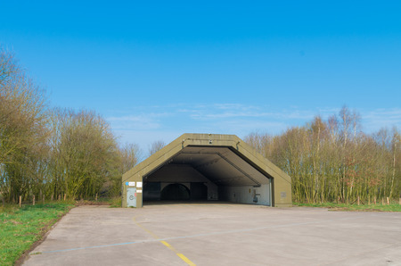 abandoned aircraft bunker on the former military airbase Twente in the netherlandsの写真素材