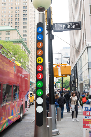 NEW YORK - MAY 2, 2016: Information pole about different subway lines on Fulton Streetのeditorial素材