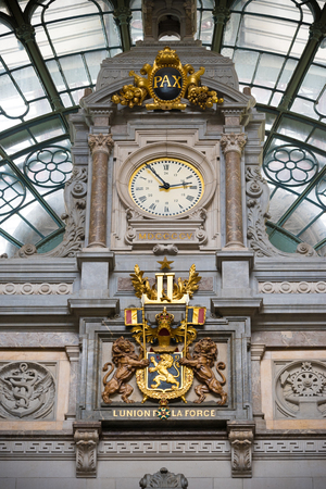 ANTWERP, BELGIUM - OCTOBER 2, 2016: Baroque interior of the central station with a gold decorated clockのeditorial素材