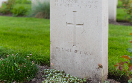 HOLTEN, NETHERLANDS - APRIL 29, 2018: Well maintained graves of fallen canadian soldiers during WW2 on the canadian war cemetaryのeditorial素材