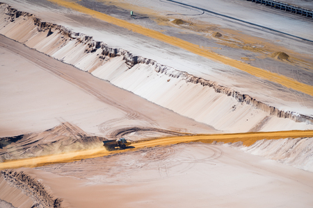 HOCHNEUKIRCH, GERMANY - JULY 7, 2018: Sand dump truck transporting sand in the Garzweiler brown coal mineのeditorial素材