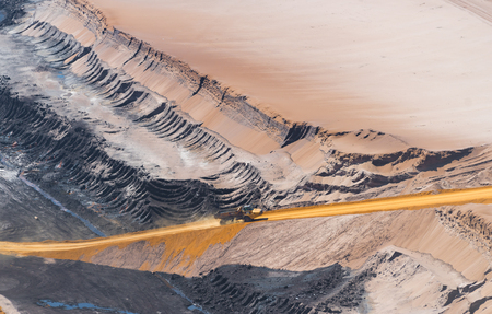 HOCHNEUKIRCH, GERMANY - JULY 7, 2018: Sand dump truck transporting sand in the Garzweiler brown coal mineのeditorial素材
