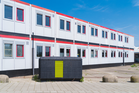 identical builder barracks on a construction siteの写真素材