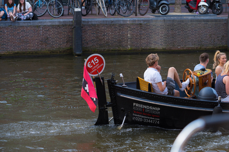 AMSTERDAM, NETHERLANDS - AUGUST 25, 2017:  Small rental boat for tourists in the dutch capitalのeditorial素材