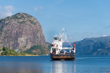 OANES, NORWAY - JULY 25, 2018: Ferry boat from Lauvvik approaching. It is a very popular crossing for tourists who want to climb the preikestolen.のeditorial素材